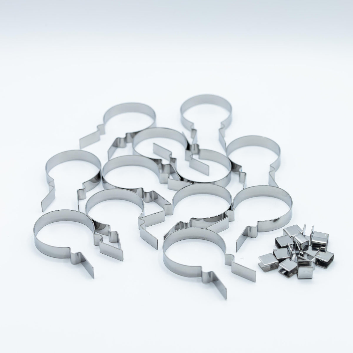 A set of stainless steel balloon-shaped sucker molds on a clean white background.