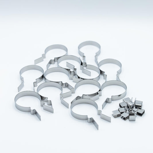 A set of stainless steel balloon-shaped sucker molds on a clean white background.