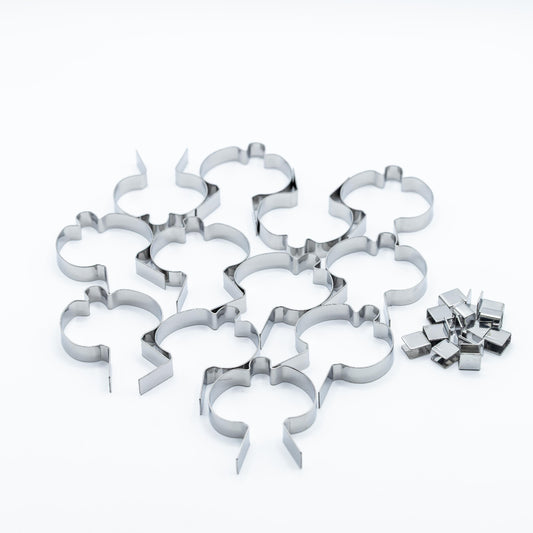 A set of stainless steel pumpkin shaped sucker molds photographed on a clean white background.